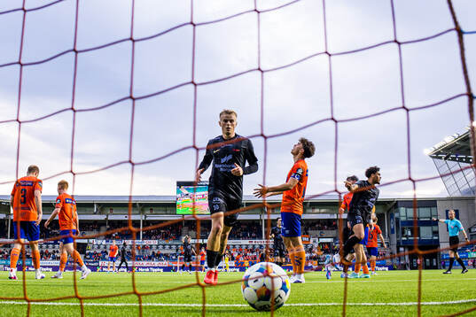 Noah Jean Holm of Brann celebrates