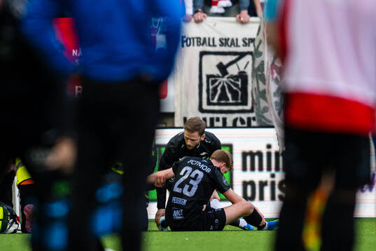 Thore Pedersen of Brann with an injury