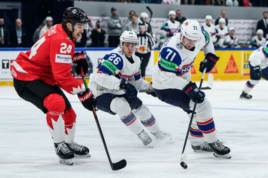 Dylan Cozens of Canada and Eskild Bakke Olsen of Norway