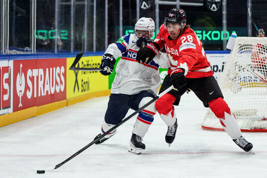 Emilio Pettersen of Norway and Zach Whitecloud of Canada