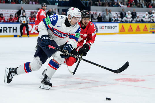 Martin Rønnild of Norway and Robert Thomas of Canada