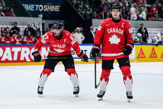 Sidney Crosby and Macklin Celebrini of Canada