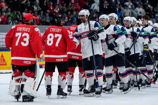 Sidney Crosby of Canada and Andreas Martinsen of Norway
