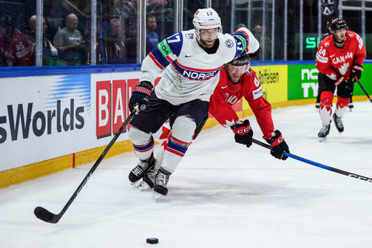 Eirik Salsten of Norway and Morgan Rielly of Canada