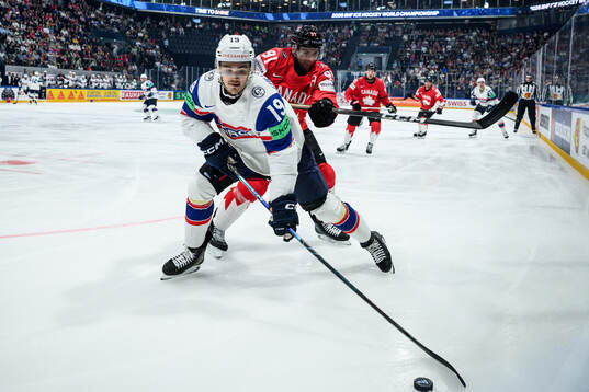 Håvard Østrem Salsten of Norway and John Tavares of Canada