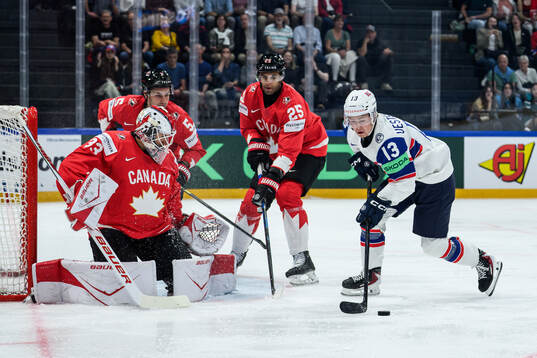 Cam Talbot, Denton Mateychuk and Darnell Nurse of Canada
