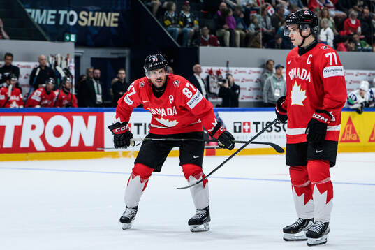 Sidney Crosby and Macklin Celebrini of Canada