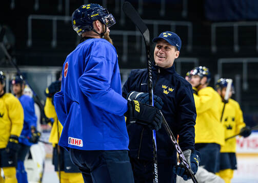 Mattias Ekholm and Head coach Sam Hallam of Sweden at a