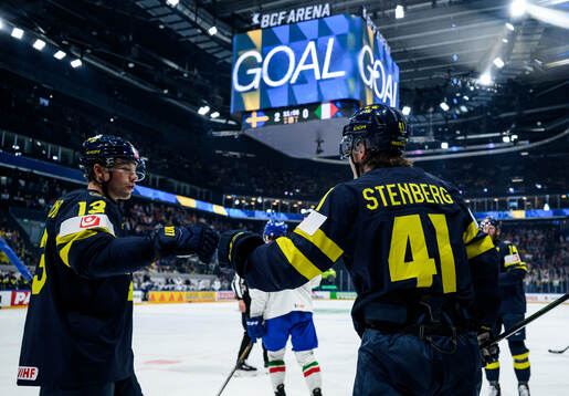 Lucas Raymond and Ivar Stenberg of Sweden celebrate