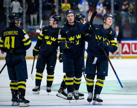 Oscar Sundqvist and Lucas Raymond of Sweden recognizes the