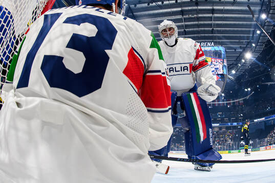 goaltender Damian Clara of Italy looks dejected