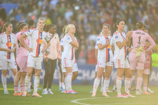 Ada Hegerberg and Ingrid Engen of Lyon look dejected