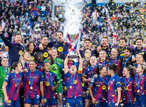 Patri Guijarro of Barcelona celebrates with the trophy