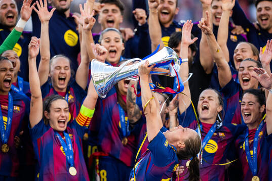 Ewa Pajor of Barcelona celebrates with the trophy