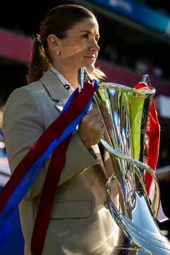 Maren Mjelde, UEFA ambassador, with the trophy