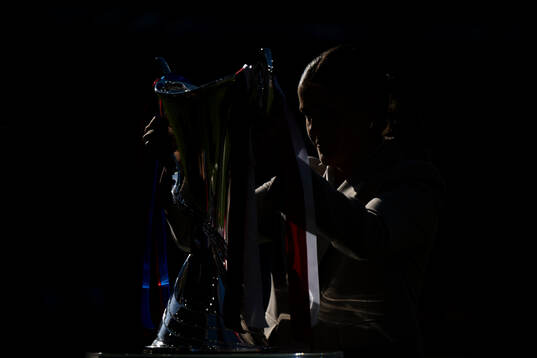 Maren Mjelde, UEFA ambassador, with the trophy