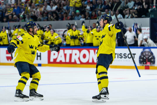 Lucas Raymond of Sweden (r) celebrates