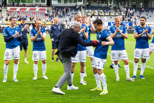 Halmstads tränare Stuart Baxter och Hussein Carneil jublar