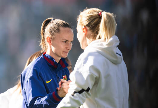 Caroline Graham Hansen of Barcelona and Ada Hegerberg of