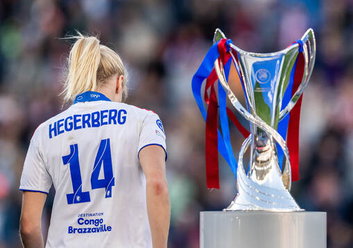 Ada Hegerberg of Lyon looks dejected as she walks past the
