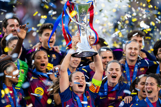 Alexia Putellas of Barcelona celebrates with the trophy