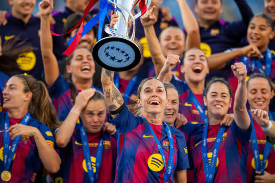 Mapi Leon of Barcelona celebrates with the trophy