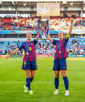 Marta Torrejon and Alexia Putellas of Barcelona celebrate