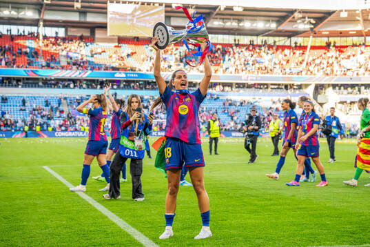 Kika Nazareth of Barcelona celebrates with the trophy