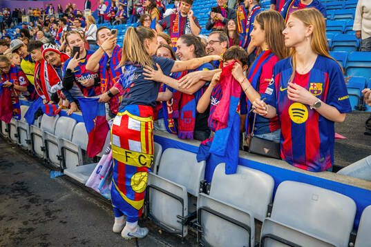 Claudia Pina of Barcelona celebrates with friends and