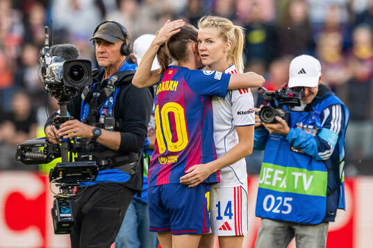 Caroline Graham Hansen of Barcelona and Ada Hegerberg of