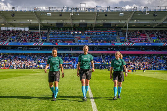 Assistant referee Almira Spahić, referee Tess Olofsson and