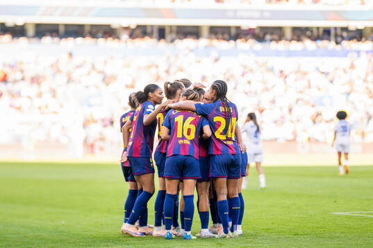 Ewa Pajor of Barcelona celebrates with teammates