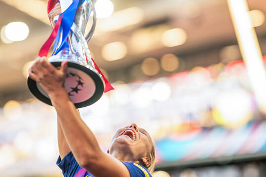 Martine Fenger of Barcelona celebrates with the trophy