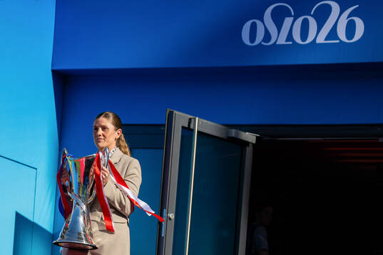 Maren Mjelde, UEFA ambassador, with the trophy