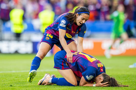 Aitana Bonmati and Ewa Pajor of Barcelona celebrate