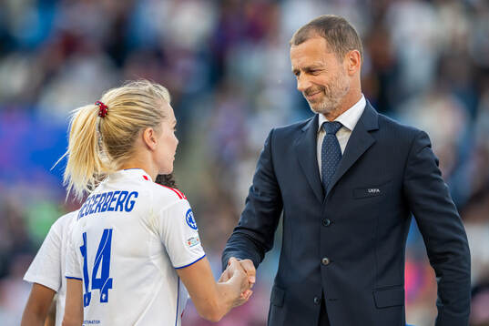 Ada Hegerberg of Lyon and Aleksander Ceferin, president of