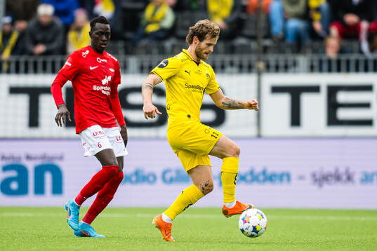 Cheikh Mbacke Diop of Brann and Ole Didrik Blomberg of