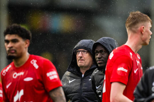 Sports director Per-Ove Ludvigsen and Cheikh Mbacke Diop of