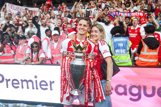 Martin Ødegaard of Arsenal celebrates with his wife Helene