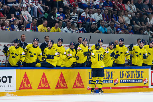 Anton Frondell of Sweden celebrate with the bench