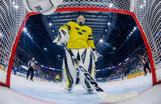Goaltender Magnus Hellberg of Sweden looks dejected