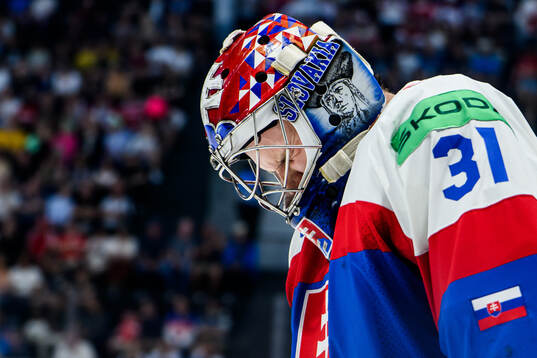 Goaltender Samuel Hlavaj of Slovakia looks dejected