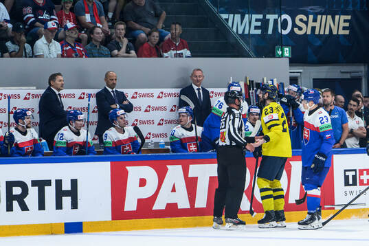 Oliver Ekman-Larsson of Sweden and the bench of Slovakia