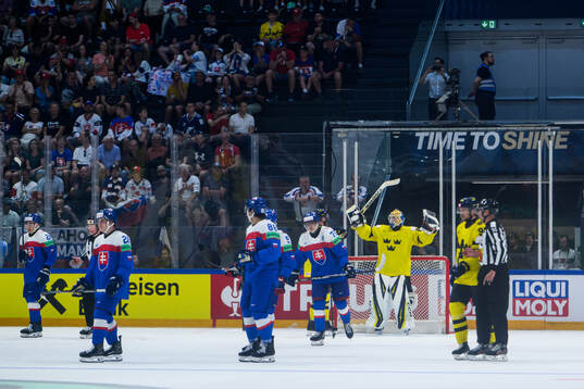 Goaltender Magnus Hellberg of Sweden celebrates