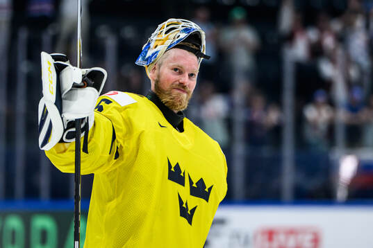 goaltender Magnus Hellberg of Sweden celebrates