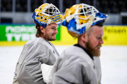 goaltender Arvid Söderblom and goaltender Magnus Hellberg