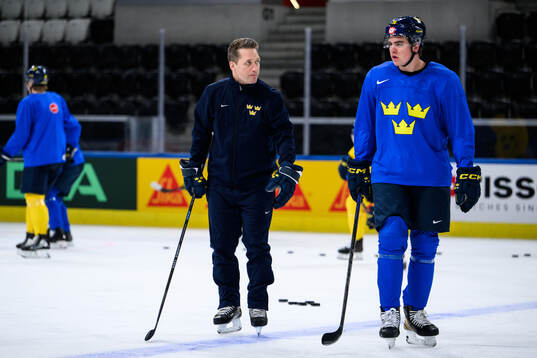 Head coach Sam Hallam and Anton Frondell of Sweden at a