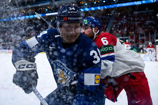 Aatu Räty of Finland and Michal Kempny of Czech Republic