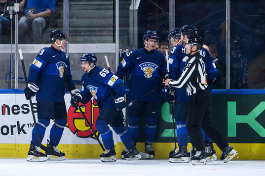 Sakari Manninen of Finland celebrates