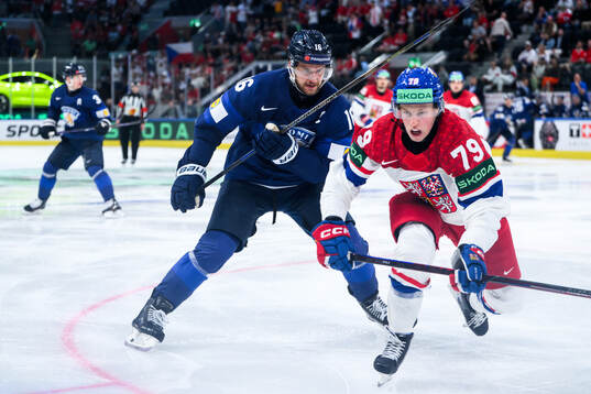 Alexander Barkov of Finland and Tomas Galvas of Czech